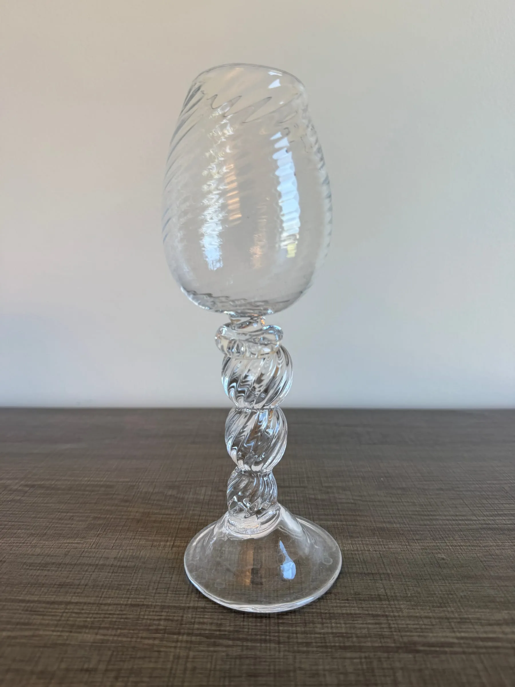 A goblet with a swirled bowl