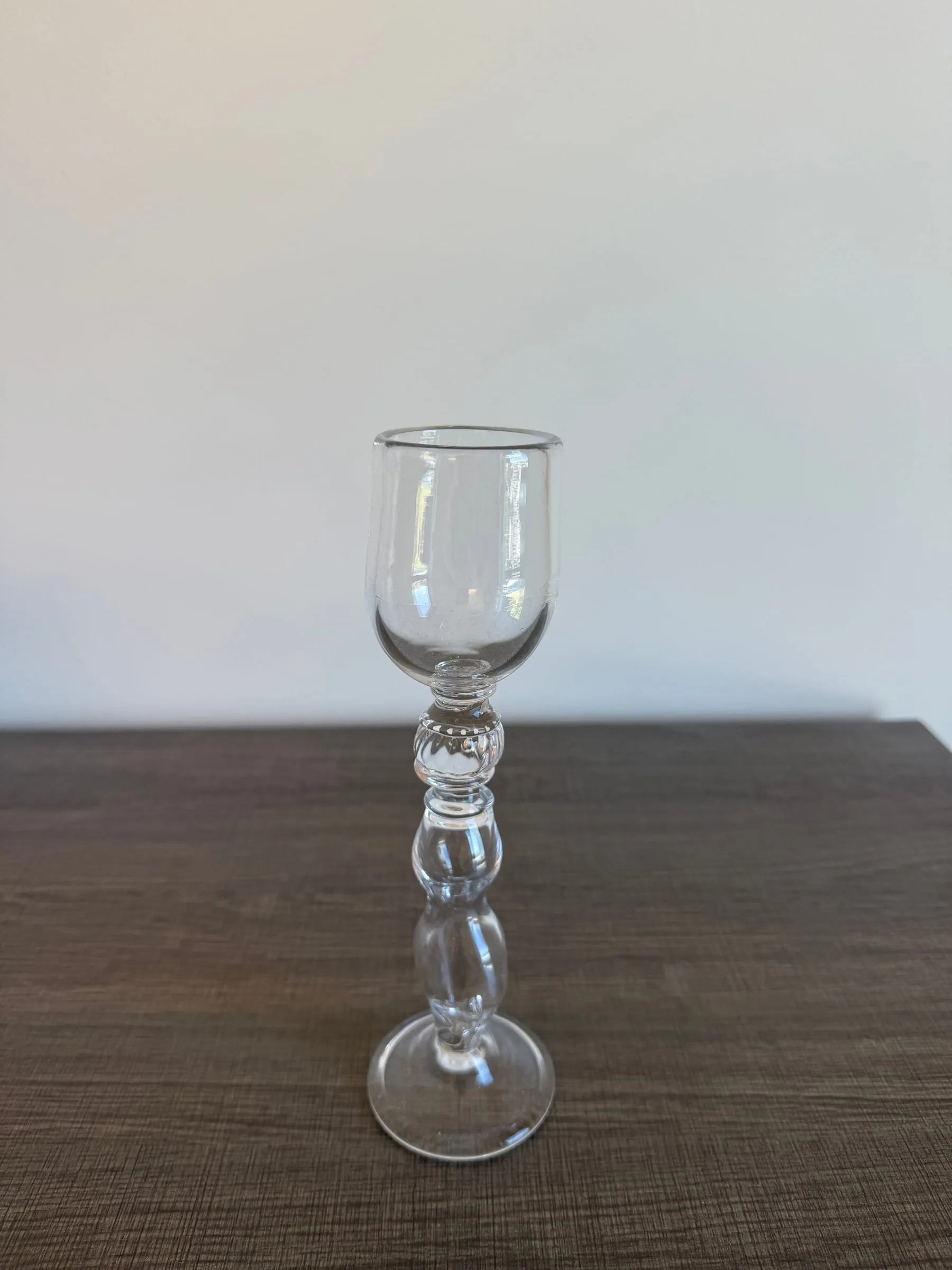 A tall, narrow goblet
